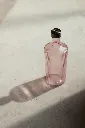 Premium_ribbed_glass_bottles_in_the_color_Pink_by_Paveau_bring_warmth_sophistication_and_modern_Belgian_design_to_every_dining_and_hospitality_setti.webp