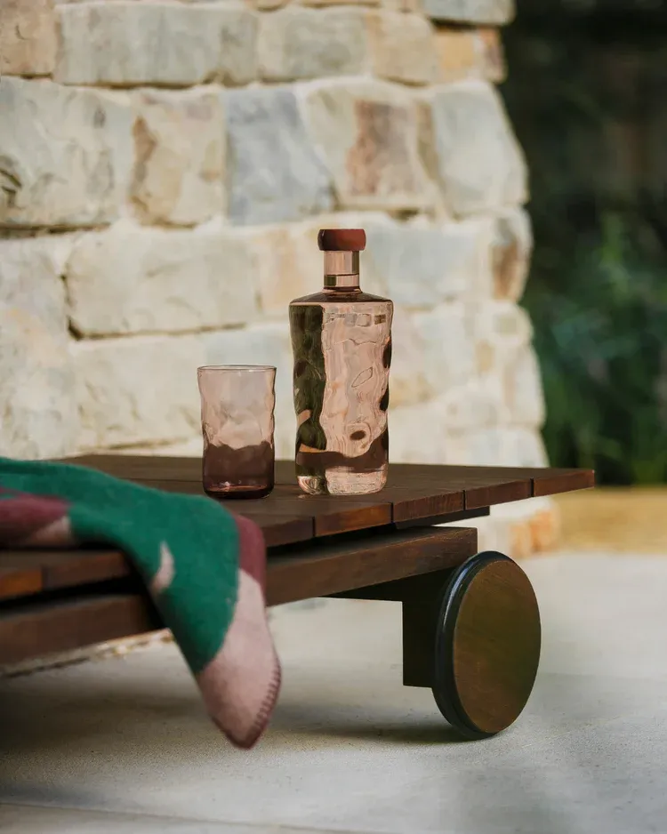 Premium_borosilicate_glass_bottles_in_the_color_Silt_by_Paveau_bring_warmth_balance_and_sophisticated_simplicity_to_every_table_setting.webp